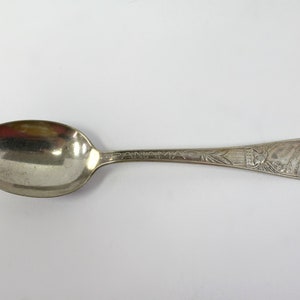 1915 Panama Canal and San Francisco Exposition Souvenir Spoon, Unmarked, The Top Shows a Map of the Atlantic and Pacific Oceans