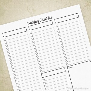 May include: A printable packing checklist with three columns for different categories of items to pack. Each column has a title box and a list of 20 blank checkboxes. There is a notes section at the bottom of the page.