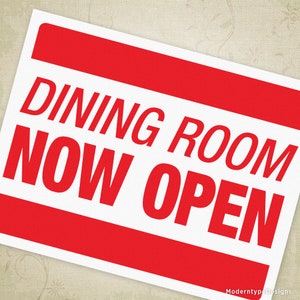 May include: A red and white sign with the text "Dining Room Now Open" in bold, white letters.