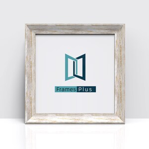 May include: A white wood picture frame with a distressed finish. The frame has a white mount and a white background. The logo "FramesPlus" is printed in blue and teal on the white background. The logo is a stylized image of two doors opening.