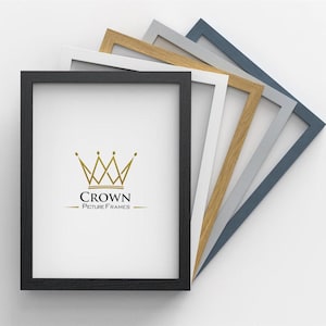 May include: A set of six picture frames in various colours, including black, white, natural wood, grey, and blue. The frames are arranged in a fan shape, with the black frame at the front. The frames are all the same size and have a simple, modern design. The front of the black frame features a gold crown logo with the text "CROWN PICTURE FRAMES".
