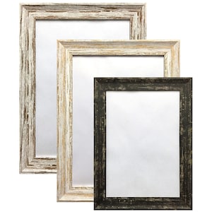 May include: Three picture frames, one black and two whitewashed wood. The frames are nested inside each other, with the largest frame on the left and the smallest frame on the right.