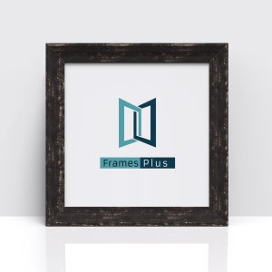 May include: A black wood picture frame with a distressed finish. The frame has a white mount and a white background with a blue and black logo that says "FramesPlus".