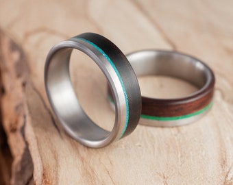 Pair of alliances and rosewood and titanium wood. Wedding ring, engagement ring. Set of alliances. Titanium alliances.