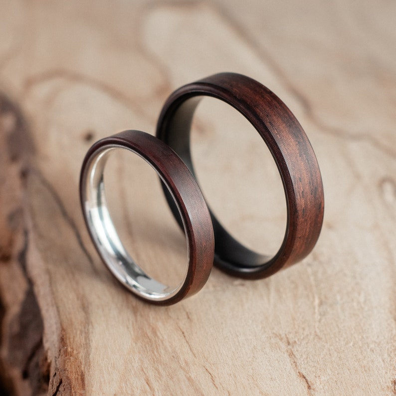 Pair of wedding rings and Rosewood wood, silver and fire-blackened titanium. Wedding ring, engagement ring. image 1