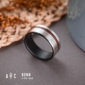 BONN. Fire-blackened titanium and Palo Santo wood ring. Wedding ring, engagement ring.