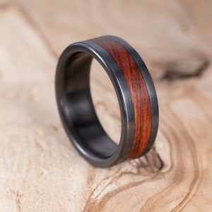 Fire-blackened titanium and Mopane wood ring. Wedding ring, engagement ring.
