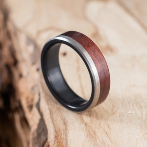 Fire-blackened titanium and Mopane wood ring. Wedding ring, engagement ring.