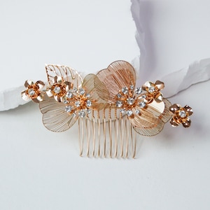 Aurora Hair Comb | bridal hair accessories featuring gold flowers and rhinestones