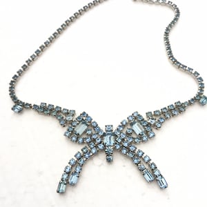 Pale Blue Rhinestone Necklace Butterfly Center Rhodium plated with hook clasp