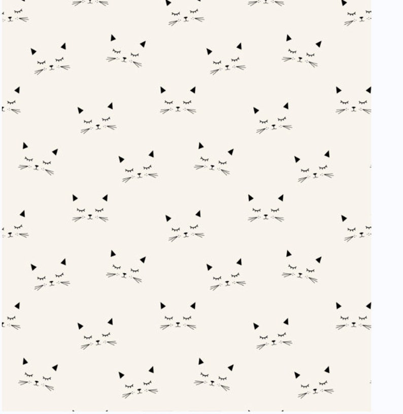 May include: A repeating pattern of stylized cat faces. Each face is black and white, featuring closed eyes, triangular ears, and whiskers. The background is a light beige color, creating a simple and playful design.