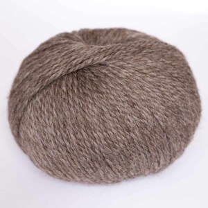 May include: A ball of brown yarn.