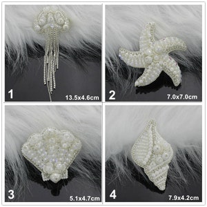 May include: Four white pearl beaded applique patches in the shapes of a jellyfish, starfish, seashell, and a seashell with a pointed tip. The patches are on a white fuzzy background. The measurements of each patch are listed below each patch.