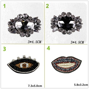 May include: Four different iron-on patches with rhinestone and bead embellishments. The patches are in the shape of an eye, a mouth, and two different styles of an eye. The patches are 3*4.5 cm, 7.3x5.0 cm, and 5.8x3.2 cm.