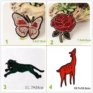 May include: Four embroidered iron-on patches. A red and white butterfly, a red rose with green leaves, a green panther, and a red deer. The patches are on a white background. The measurements of each patch are listed below each image.