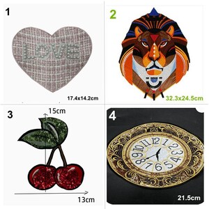 May include: Four iron-on patches with different designs. The first patch is a pink heart with the word "LOVE" in white beads. The second patch is a colorful lion's head. The third patch is a green leaf with two red cherries. The fourth patch is a gold clock face with Roman numerals.