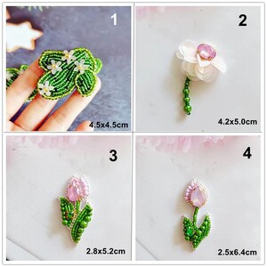 May include: Four embroidered flower patches with green leaves and pink centers. The patches are 4.5x4.5cm, 4.2x5.0cm, 2.8x5.2cm, and 2.5x6.4cm.