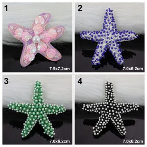 May include: Four different starfish embellishments. The first is pink with iridescent sequins and a pearl centre. The second is white with blue beads. The third is green with white beads. The fourth is black with white beads. All are approximately 7.0 x 6.2 cm.