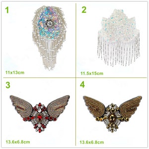 May include: Four decorative appliques. Top left: a sequined and beaded teardrop shape, 4.3 x 5.1 inches. Top right: a white beaded design with fringe, 4.5 x 5.9 inches. Bottom left: a red and silver wing design, 5.4 x 2.7 inches. Bottom right: a gold wing design, 5.4 x 2.7 inches.