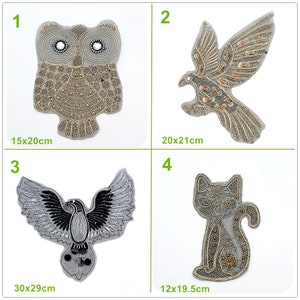 May include: Four embroidered iron-on patches featuring an owl, a bird, a bird with spread wings, and a cat. The patches are all in shades of gold and silver with black accents. The patches are approximately 15x20cm, 20x21cm, 30x29cm, and 12x19.5cm.