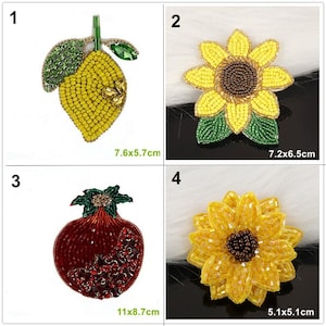 May include: Four beaded patches: a yellow lemon with green leaves measuring 7.6x5.7cm, a yellow sunflower with green leaves measuring 7.2x6.5cm, a red pomegranate with green leaves, and a yellow sunflower measuring 5.1x5.1cm.