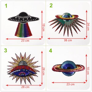 May include: Four embroidered space-themed patches. Designs include a UFO with rainbow detailing (23 cm x 19 cm), a planet with starbursts (38 cm x 24 cm), a UFO with a sunburst (28 cm x 28 cm), and a planet (23 cm x 10 cm).