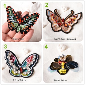 May include: Four embroidered iron-on patches featuring colorful butterfly and bee designs. The butterfly patches are 6.5 cm by 8 cm, 8 cm by 5.5 cm, and 7.2 cm by 5.6 cm. The bee patch is 5.6 cm by 3.4 cm.