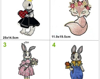May include: Four embroidered iron-on patches featuring a bunny holding a heart, a fox with a flower crown, a bunny holding flowers, and a bunny wearing overalls. The patches are approximately 25x14.5cm, 11.9x19.5cm, 32x16.5cm, and 31.3x15.5cm.