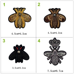May include: Four embroidered iron-on patches featuring bee designs. The patches are in different colors and sizes. The first patch is gold with a 4.5 inch by 4.2 inch measurement. The second patch is brown with a 4.5 inch by 4.2 inch measurement. The third patch is black with a 3.5 inch by 3.2 inch measurement. The fourth patch is silver with a 7.5 inch by 8.7 inch measurement.