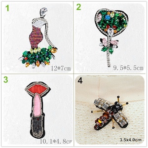 May include: Four embroidered iron-on patches with rhinestones and sequins. The patches feature a woman, a heart, a mushroom, and a bee. The patches are approximately 12x7 cm, 9.5x5.5 cm, 10.1x4.8 cm, and 3.5x4.0 cm.