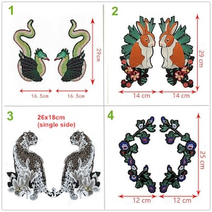 May include: Four iron-on patches with embroidered designs. The first patch features two green snakes with black wings. The second patch features two orange rabbits with green leaves and pink flowers. The third patch features two gray leopards with white flowers. The fourth patch features a circular wreath of green leaves and blue flowers.