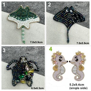 May include: Four embroidered iron-on patches featuring a green and white stingray, a black and silver stingray, a black and green turtle, and two purple seahorses with gold accents. The patches are approximately 7.0 x 5.9 cm and 6.5 x 6.3 cm.