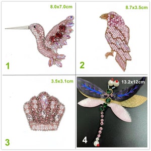 May include: Four pink and white beaded applique patches. The first patch is a hummingbird, the second is a bird, the third is a crown, and the fourth is a dragonfly. The patches are all approximately 3 inches in size.