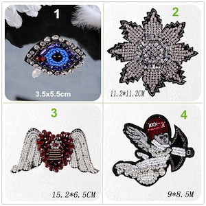 May include: Four iron-on patches with various designs. The first patch is a blue eye with rhinestones. The second patch is a silver star with rhinestones. The third patch is a red heart with wings and rhinestones. The fourth patch is a white angel with wings and pearls. The patches are approximately 3.5 x 5.5 cm, 11.2 x 11.2 cm, 15.2 x 6.5 cm, and 9 x 8.5 cm.