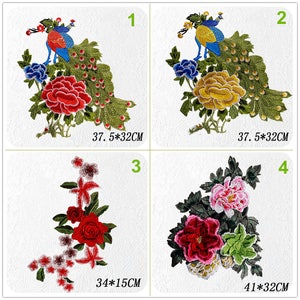 May include: Embroidered patches featuring floral and bird designs. Patch 1 shows a peacock with a red flower, measuring 14.7 x 12.6 inches. Patch 2 has a peacock and yellow flower, same size. Patch 3 has red roses, 13.4 x 5.9 inches. Patch 4 has flowers, 16.1 x 12.6 inches.
