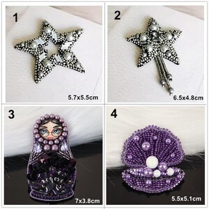 May include: Four beaded brooches: 1) a star with silver beads and clear crystals, 5.7x5.5cm; 2) a star with silver beads and dangling strands, 6.5x4.8cm; 3) a doll face with purple beads and crystals, 7x3.8cm; 4) a purple shell with pearls, 5.5x5.1cm.