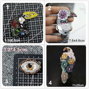 May include: Four embroidered iron-on patches featuring colorful toucans, an eye, and a parrot. The toucans are 5.5 x 6.0 cm and 7.0 x 4.8 cm. The eye is 3.2 x 4.5 cm. The parrot is 11 x 25 cm.