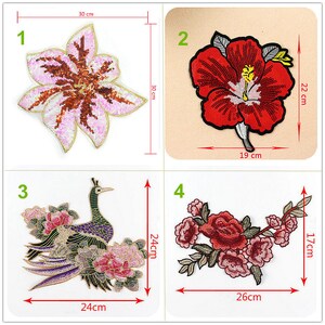 May include: Four embroidered iron-on patches featuring floral and animal designs. The patches are approximately 30 cm x 30 cm, 19 cm x 22 cm, 24 cm x 24 cm, and 26 cm x 17 cm.
