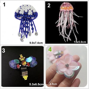 May include: Four different embroidered patches, including a blue and white jellyfish, a pink jellyfish with feathers, a bee with iridescent wings, and a pink flower. The patches are approximately 9.0x7.4 cm, 13x5.0 cm, 5.3x6.5 cm, and 4.0 cm in size.