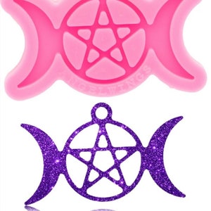 May include: Pink silicone mold for making a pendant with a pentagram and triple moon design. The mold is made by "Angry Wings".