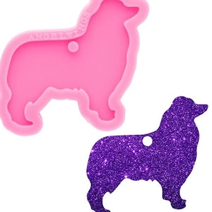 May include: Pink silicone mold of an Australian Shepherd dog. The mold is used to create resin crafts. The mold has a hole for a keychain or charm.