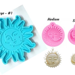 May include: Three silicone molds of a sun and moon design. The molds are in different sizes: large, medium, and small. The large mold is blue, and the medium and small molds are pink.
