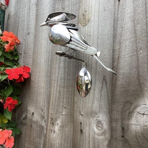 Upcycled Silverware Bird Sculpture: Welded Metal Art