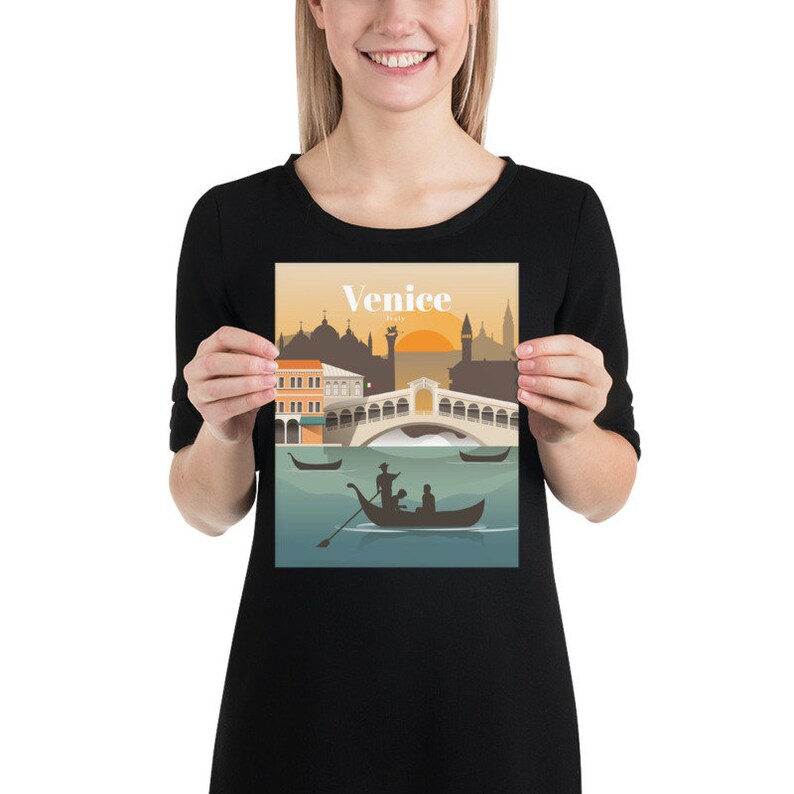 May include: A colorful illustration of Venice, Italy, with a gondola on the water in the foreground. The Rialto Bridge is in the background with buildings and a sunset.