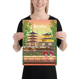 May include: A colorful illustration of a traditional Japanese temple with a pagoda, surrounded by bamboo trees. Two women in kimonos walk along a path with red umbrellas. The text "Kyoto, Japan" is displayed at the top of the image.