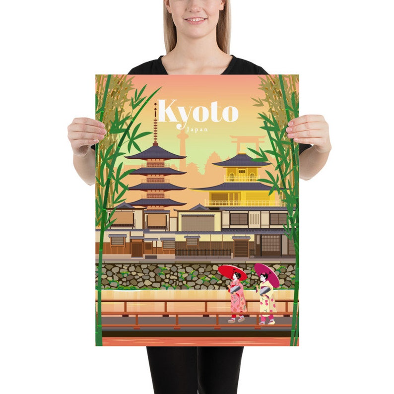 May include: A colorful illustration of a traditional Japanese temple with a pagoda and a golden building. The illustration is set against a backdrop of bamboo trees and a sunset sky. The text "i Kyoto Japan" is displayed in white letters on a red background.