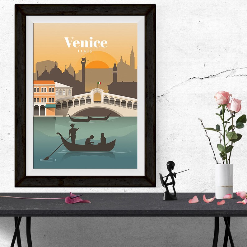 May include: A vintage-style poster with a silhouette of the Rialto Bridge in Venice, Italy. The poster has a yellow and orange sunset background with the text "Venice, Italy" at the top.