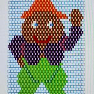 May include: A pixelated image of a brown cartoon character wearing a purple jacket, green trousers, and an orange hat. The character has a smiling face with blue eyes and a red mouth.