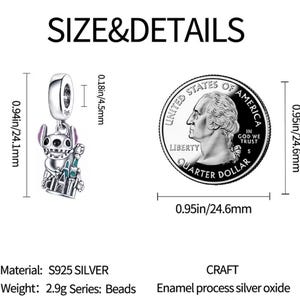 May include: A silver charm with a cartoon character design, measuring 0.94 inches (24.1 mm) in height. The charm features a detailed design and is accompanied by a quarter for size comparison. The text "SIZE&DETAILS" is displayed.