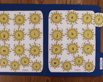 May include: A blue file folder, labelled "Sunny Letters", open to show alphabet letters within yellow sun designs. The letters are in a clear font. The folder is designed for educational use.